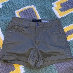 green jean shorts